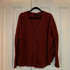 UO thermal button front top